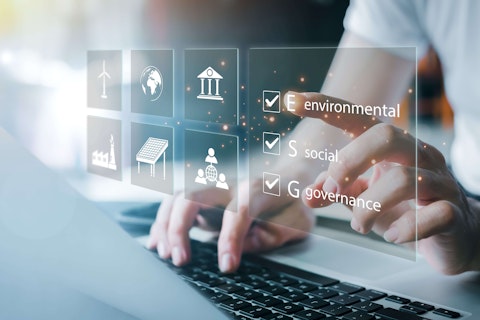 ESG. environment social governance investment business concept. Businessmen use a computer to analyze ESG, surrounded by ESG icons close to the computer screen in business investment strategy concept.